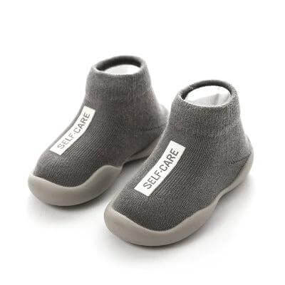 Baby Toddler Combed Cotton Floor Socks Breathable Cute gray mesh-knit non-slip floor socks with rubber sole and SELF-CARE label for crawling toddlers