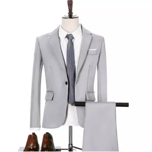 Classic Men's Slim Fit Three-Piece Suit for Formal Wear on mannequin in light gray with tie, pocket square, trousers and brown dress shoes