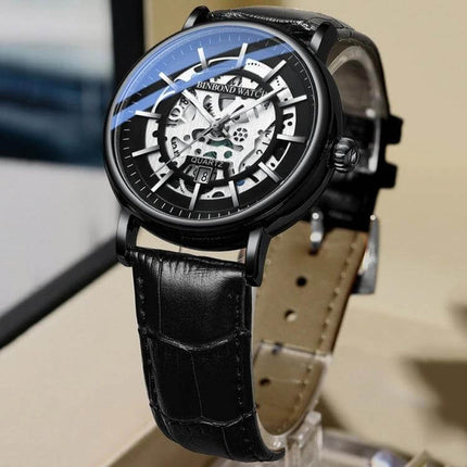 BINBOND Multifunctional Luminous Waterproof 44mm Mens Wrist Watch with black leather strap, skeleton dial, date display and luminous hands