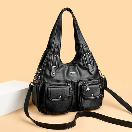 Heart Shaped PU Crossbody Handbag For Everyday Carry - black PU heart shaped bag with three straps, stitched detailing, pockets for phone wallet keys cosmetics