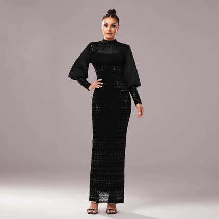Long Sleeve Round Neck Sequined Slit Evening Dress Black modeled in full-length high-waist silhouette with subtle sequined shine for gala or wedding