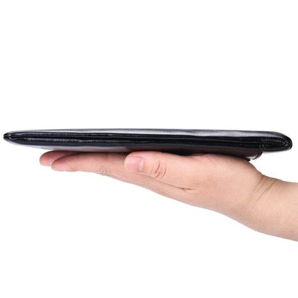 Men's Long Leather Wallet With Zipper Phone Bag Black shown slim in hand with soft leather, card slots, cash compartment and external phone pocket