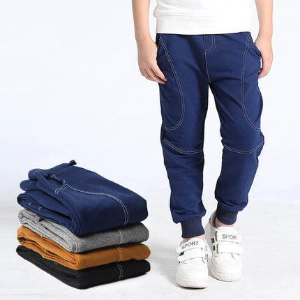 Boys' Sports Trousers Korean Style For Casual Everyday Wear - navy full-length casual trousers with contrast stitching and sneakers