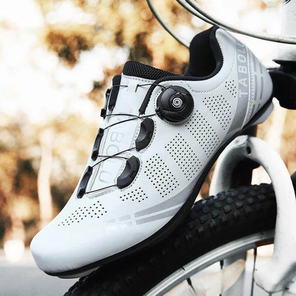 Breathable Cycling Shoes For Men Everyday Road Riding white ventilated road cycling shoe with dial closure on bike tire