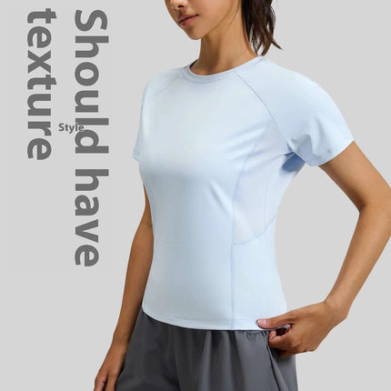 Breathable Women's Running Short Sleeve Tee For Daily Workouts modeled in light blue breathable quick-dry shirt for running and gym