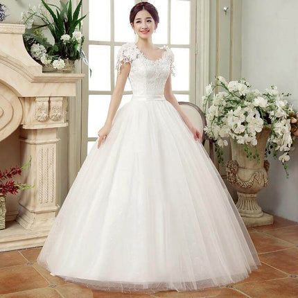 Bridal Gauze Dress With Lace Shoulder Detail For Wedding Day in airy ballgown silhouette with delicate lace shoulders and soft flowing gauze skirt