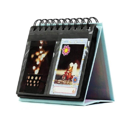 Calendar Style Desktop Standing Folder Album 68 Photos shown standing with two photo pockets and spiral calendar-style binding