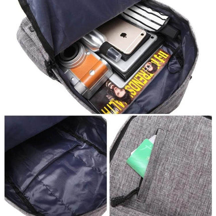 Canvas Laptop Backpack For 15.6 Inch Laptops Commuter Pack with padded sleeve and multiple pockets showing camera, phone, tablet and travel essentials