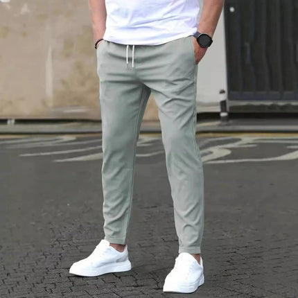 Casual Cropped Straight Pants For Leisure In Solid Black - model wearing cropped straight pants in light gray for casual outings, ankle-length modern fit