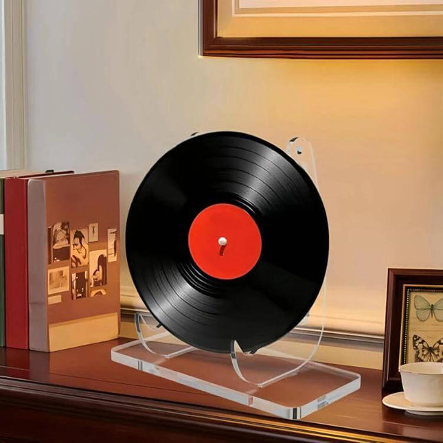 Acrylic Picture Frame Stand Plate Holder For Photos displaying a vinyl record on a clear acrylic stand on a tabletop