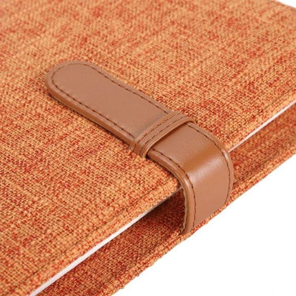 Cotton Linen Photo Album For 3 Inch Photos And Mini Cards - closeup of orange cotton linen cover with brown leather strap