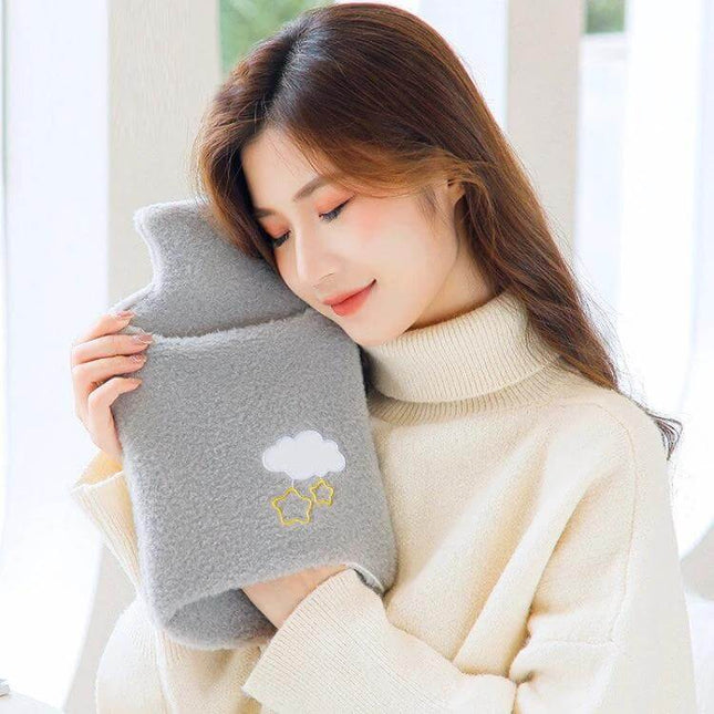 Detachable Rubber Hot Water Bottle Cover 2000ml Pink Rabbit - cozy gray fleece cover with cloud embroidery held by smiling woman