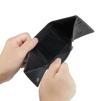 DG.MING Leather Card Wallet For Everyday Use At Home And On The Go - open black genuine leather card wallet with magnetic closure held in hands