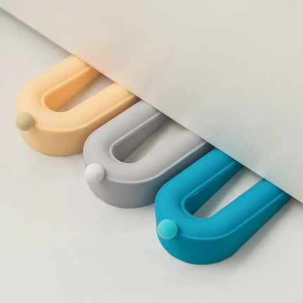 Donut Door Stopper Hole-Free For Quiet Home Protection - three pastel adhesive donut door stoppers under door, non-marking quiet floor protector
