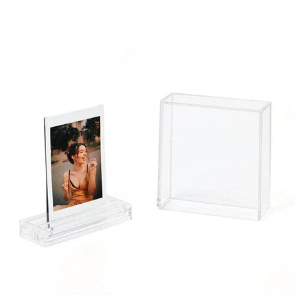 Photo Frame Stand for Polaroids - Double-Sided for Easy Display, clear polycarbonate stand holding a single 3-inch Polaroid photo