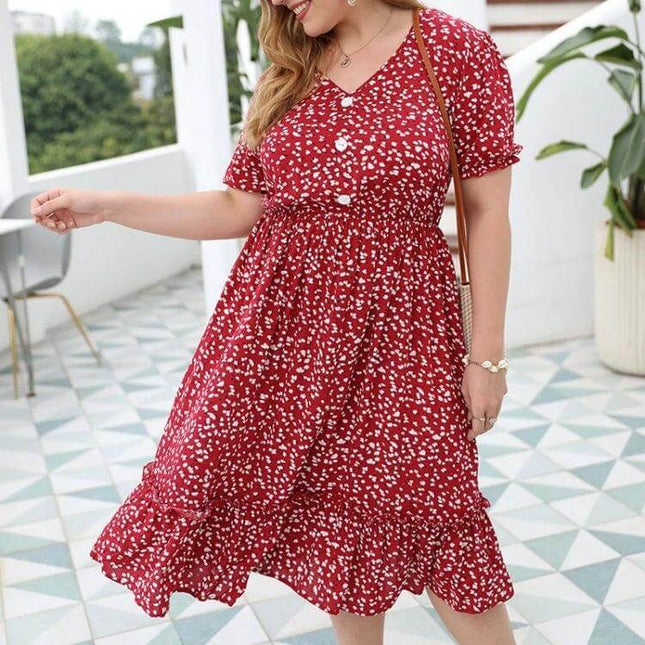 Women's Plus Size Floral Cotton Sun Dress in Rouge Color on model, knee-length ruched waist, short sleeves, white floral print