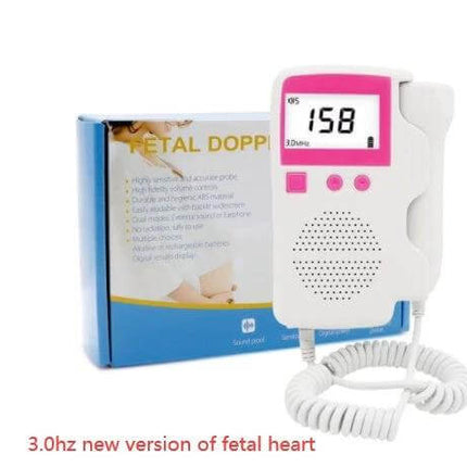 Portable Fetal Heart Rate Monitor for Home Pregnancy Use handheld fetal doppler device with display showing 158 bpm and coiled probe cable