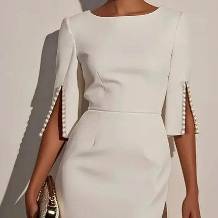 Elegant Pearl Accent Dress With Slit Sleeves For Everyday Wear in ivory polyester with pearl trim on slit sleeves, styled with a clutch