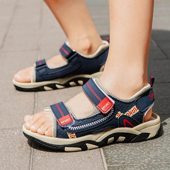 Elementary School Boys Velcro Sandals For Everyday Comfort - navy striped synthetic leather sandals with single adjustable Velcro strap