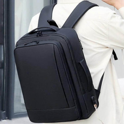 Expandable Business Waterproof Laptop Backpack For Work With USB Port shown worn on back, expandable 5cm, side USB charging port, fits 16-inch laptop