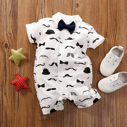 Soft Cotton Gentleman's Long-Sleeved Baby Romper for Daily Wear - white cotton romper with black gentleman print and navy bow tie, paired with baby shoes