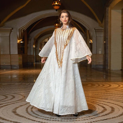 Festival Evening Dress With Embroidered Mesh For Elegant Occasions - white embroidered mesh gown with gold fringe detailing in ornate hall