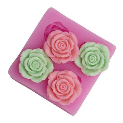 Flower Silicone Mould For Soap And Fondant Decoration - pink silicone rose mold with four detailed floral cavities for soap, fondant, and crafts