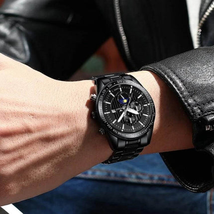 FNGEEN Mens Casual Quartz Watch With Black Leather Strap on wrist, 43.5mm case, black dial, simple pointer display and date — everyday office-to-weekend style