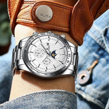 FNGEEN Mens Casual Quartz Watch With Black Leather Strap on wrist showing silver case, white dial, date and moonphase, tempered glass, 30m waterproof