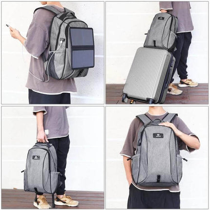 Foldable Solar Laptop Backpack With USB Charging On The Go showing removable solar panel charging phone while traveling