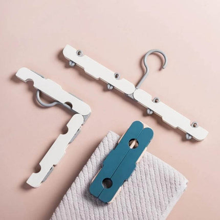 Travel Foldable Clothes Hanger On The Go Anti Skid compact ABS foldable travel hanger for shirts socks underwear, anti-skid design, packs flat