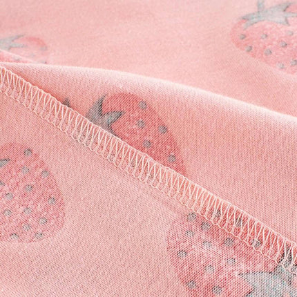 Girls Strawberry Short Sleeve Cotton T Shirt For Everyday Summer Wear - close-up of pink cotton fabric with strawberry print and overlock seam