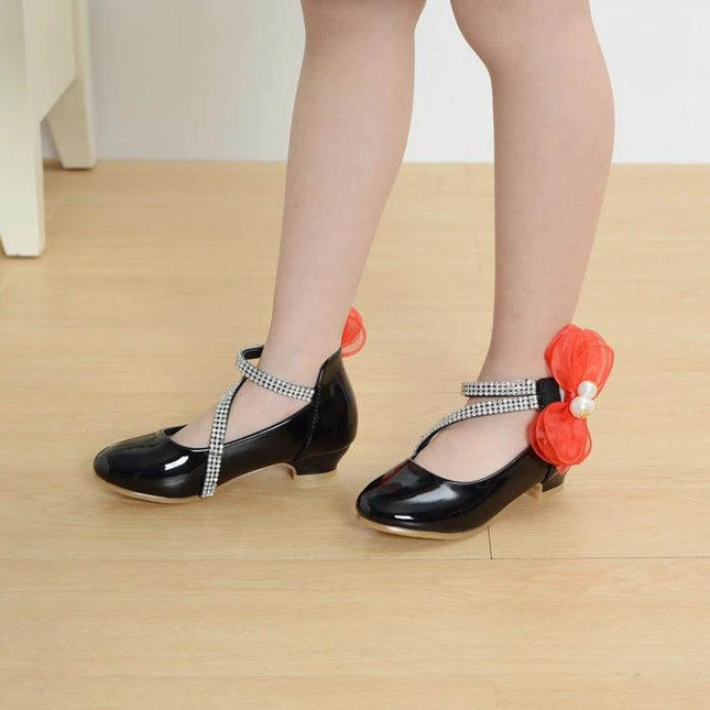 Girls Princess High Heel Dress Shoes For Ages 7 To 12 black patent heels with rhinestone straps and red flower detail for kids, Velcro closure