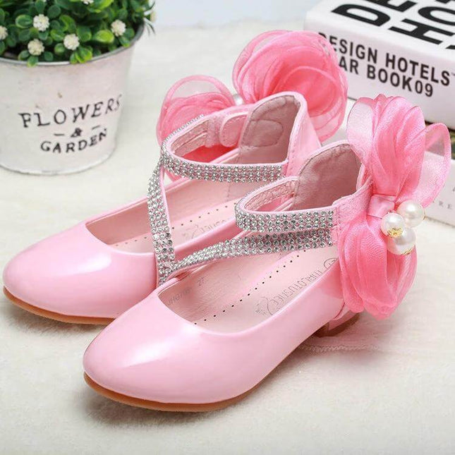 Girls Princess High Heel Dress Shoes For Ages 7 To 12 - pink patent dress shoes with rhinestone Velcro straps and decorative flower bow