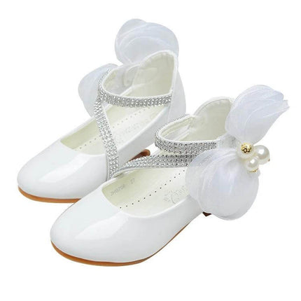 Girls Princess High Heel Dress Shoes For Ages 7 To 12 white patent dress shoes with rhinestone strap and flower bow detail
