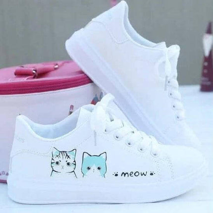 Girls Casual Leather Sneakers Flat Rubber Sole For Everyday — white girls leather sneakers with flat rubber sole, cat print and 'meow' detail