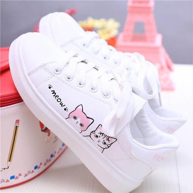 Girls Casual Leather Sneakers Flat Rubber Sole For Everyday white leather low-profile girls sneakers with cat print, flat rubber sole for walking and school