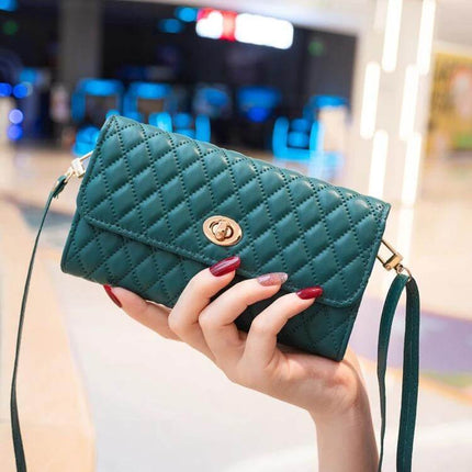 Crossbody PU Horizontal Bag for Large Capacity Everyday Essentials quilted green PU leather crossbody with gold clasp held in hand