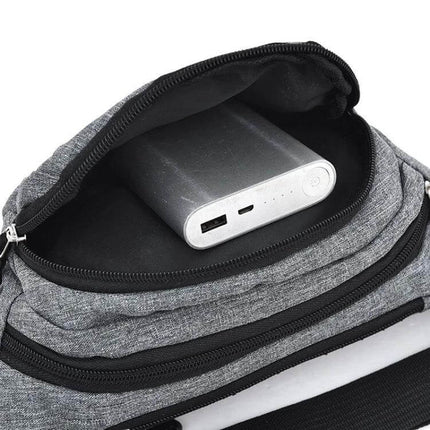 Crossbody Chest Bag With Multi Function Pockets For Everyday Use — grey Oxford cloth chest bag showing interior pocket with power bank