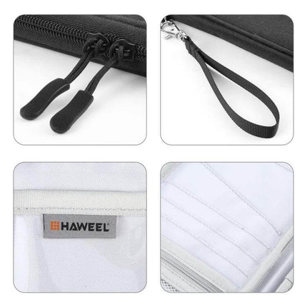 HAWEEL Clutch Bag Passport Wallet For Travel Documents And Cards showing zipper pulls, wrist strap, inner card slots and branded lining