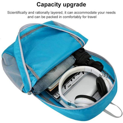 HAWEEL Hiking Backpack Large Capacity For Outdoor Use: blue foldable pack open showing headphones, tablet, clothes neatly packed