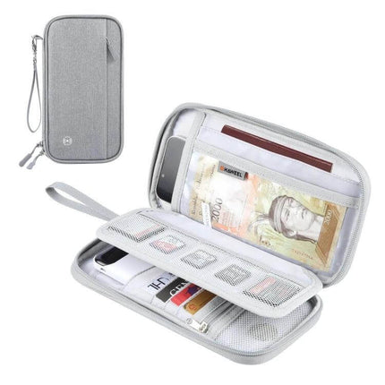 HAWEEL Clutch Bag Passport Wallet For Travel Documents And Cards in grey showing organized passports, cards, phone and currency with wrist strap