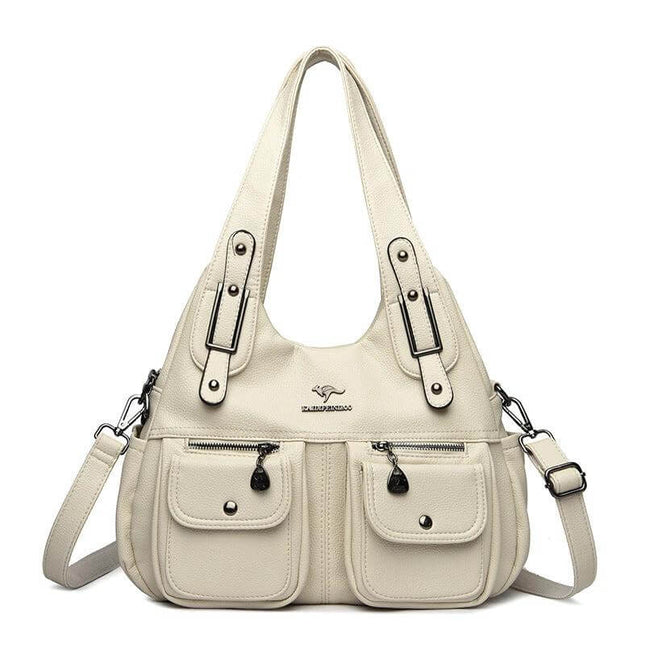 Heart Shaped PU Crossbody Handbag For Everyday Carry in beige soft PU with stitched detailing, pockets and three strap options for hands-free daily use
