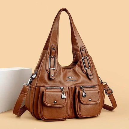 Heart Shaped PU Crossbody Handbag For Everyday Carry - brown PU heart-shaped bag with multiple pockets, stitched detailing and three strap options