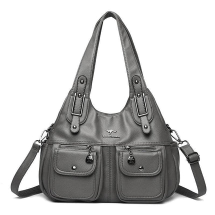 Heart Shaped PU Crossbody Handbag For Everyday Carry in gray soft PU with stitched detailing, two front pockets and three shoulder strap options