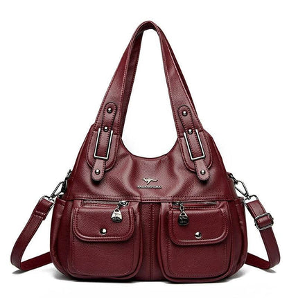 Heart Shaped PU Crossbody Handbag For Everyday Carry in burgundy PU with stitched detailing, three straps and front pockets for essentials