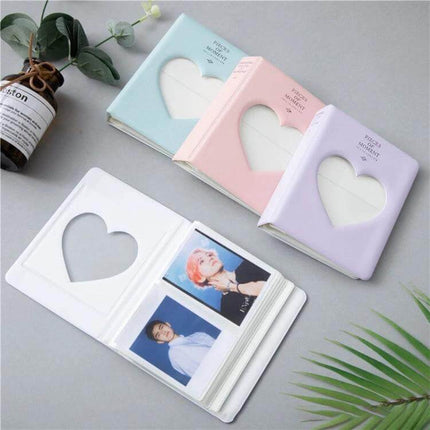Hollow Heart 64 Pockets Photo Album for Instax Mini Sky Blue - compact sky blue PVC photo album with hollow heart cover holding Instax Mini photos