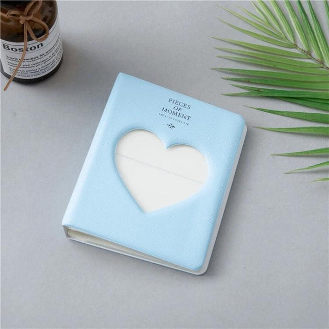 Hollow Heart 64 Pockets Photo Album for Instax Mini Sky Blue - compact sky blue PVC album with hollow heart cover for Instax Mini photos
