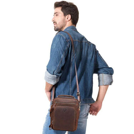 HUMERPAUL Men's Leather Messenger Shoulder Bag Everyday Use shown on man wearing brown full-grain leather crossbody bag with slim profile and pockets