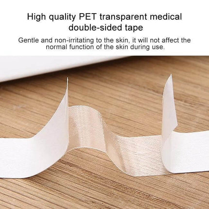 Invisible Anti-Slip Shirt Straps For Secure Wear, 85x18mm clear PET double-sided adhesive strips shown on wood surface